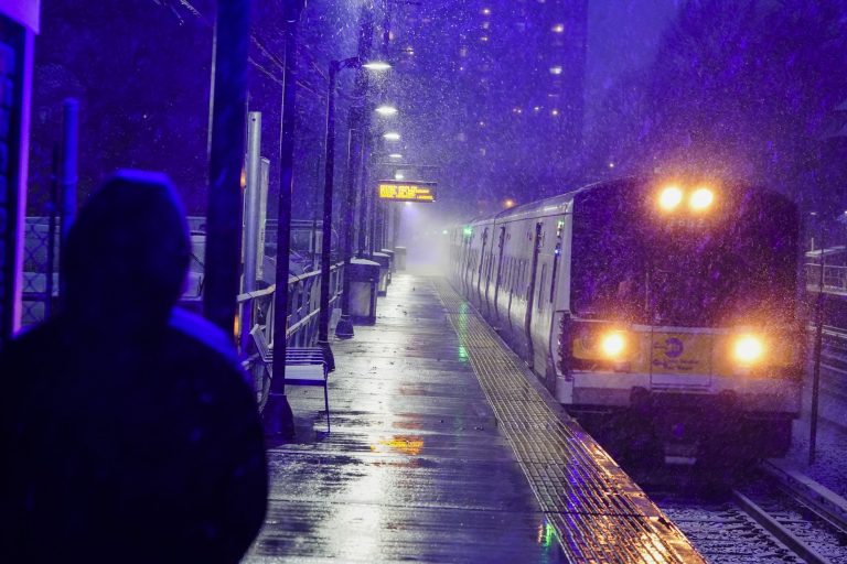 Snow continues to fall on Northeast US, with vaccines in tow