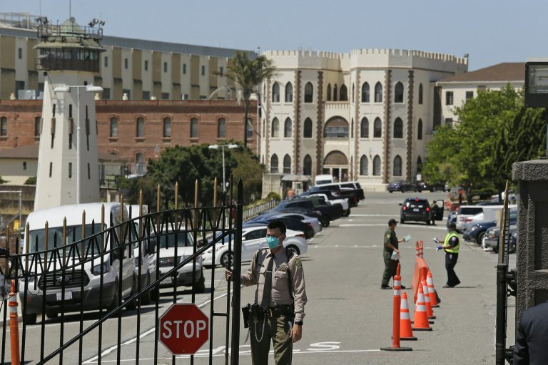 COVID-19 spikes follow in prisons after inmate transfers