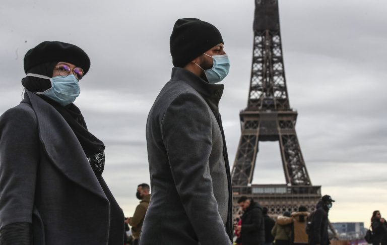 The Latest: Oman starts vaccinations with 1st batch of shots