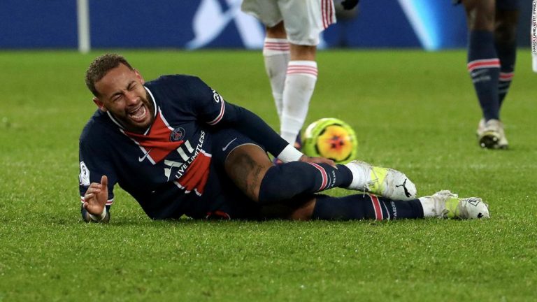 PSG faces anxious wait on Neymar injury after Brazilian star stretchered off in defeat by Lyon
