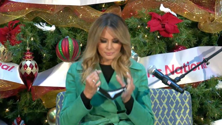Melania Trump breaks children’s hospital rules by taking her mask off to read to patients