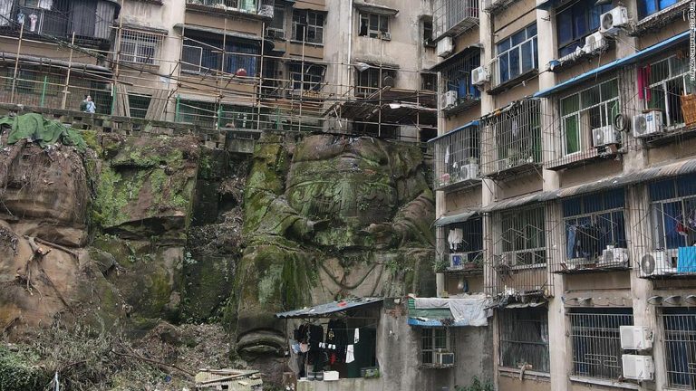 Headless religious statue uncovered in residential complex in China