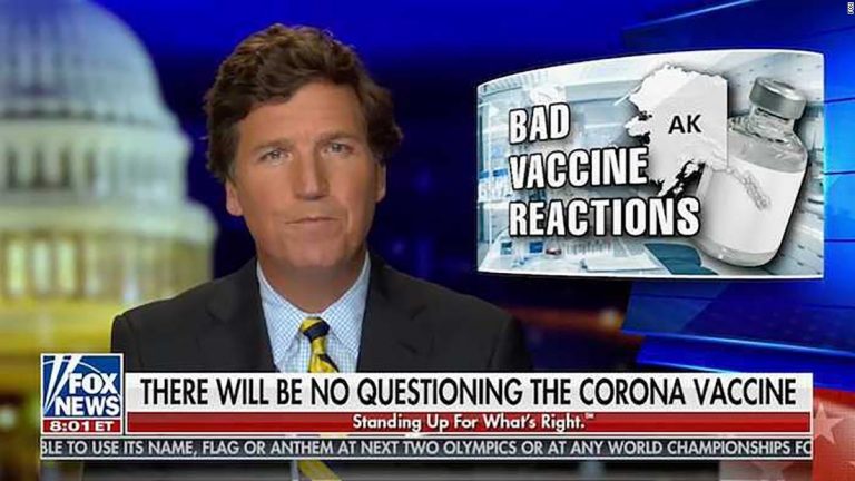 Tucker Carlson claims vaccine campaign ‘feels false, because it is’