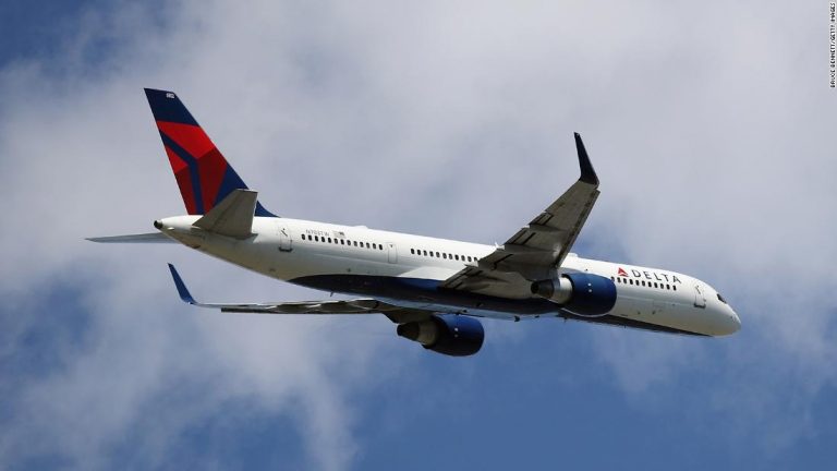 2 passengers open Delta flight cabin door and slide out moving plane with a dog at La Guardia 2 passengers open Delta flight cabin door and slide out moving plane with a dog at La Guardia