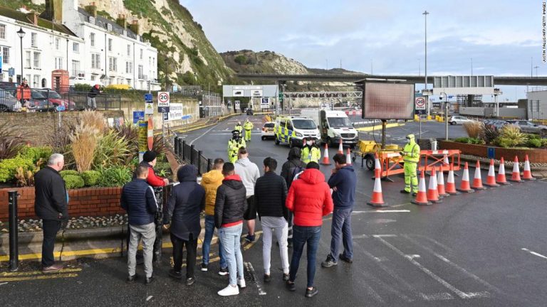 Trucks pile up in England as UK and France hold crisis talks to reopen border
