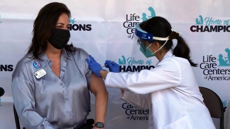 Staff at nursing home of coronavirus outbreak receive vaccine