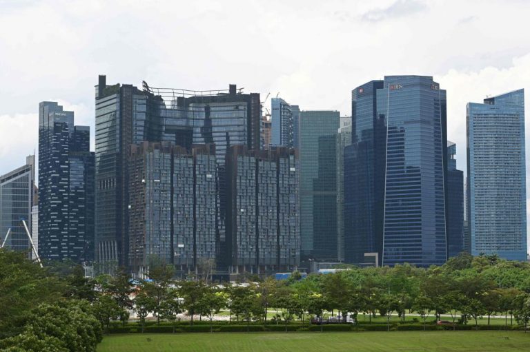 UK signs Singapore trade deal as EU talks falter