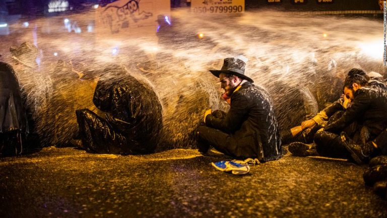 Violence and slurs from some of Israel’s ultra-Orthodox Jews in battle over coronavirus lockdowns