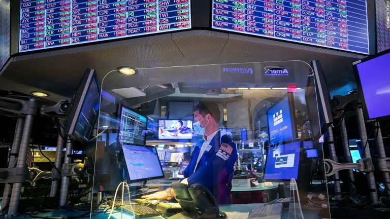 Dow slips while GameStop and others continue to soar