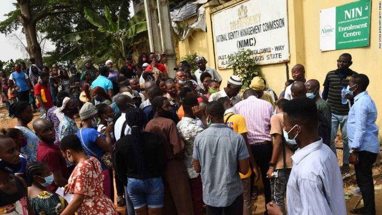 As Covid-19 cases rise in Nigeria, a government policy is creating crowds and chaos