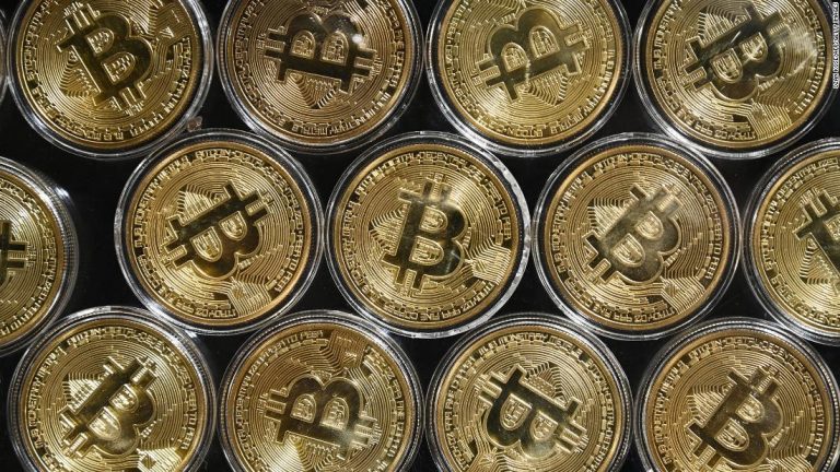 Bitcoin’s market value tops $1 trillion