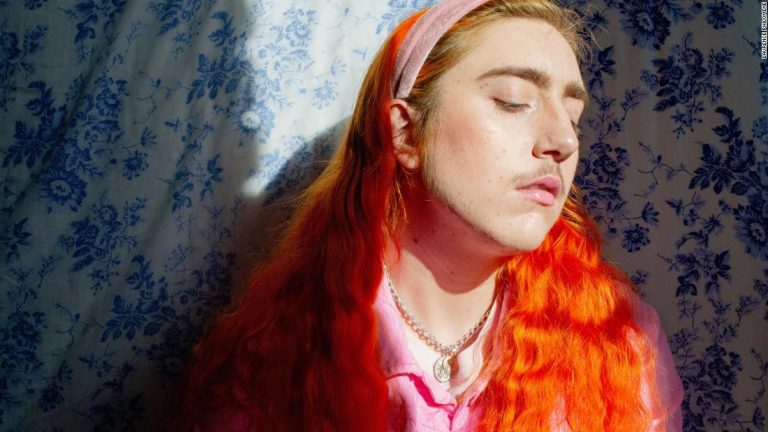 A photographer shows the beauty of their transition through vivid self-portraits