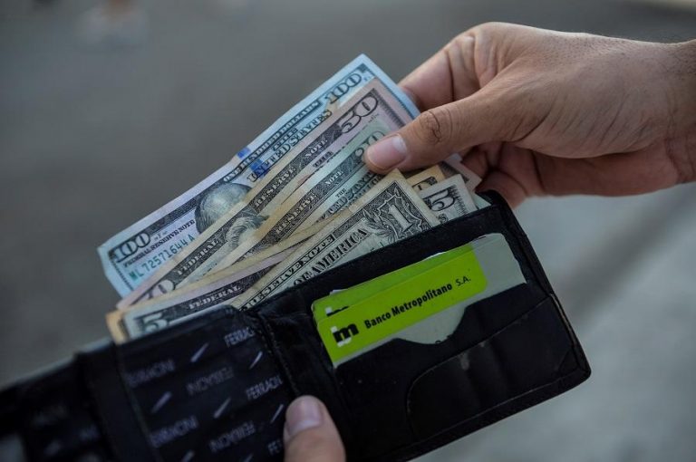 Dollar hovers near seven-week high after boost from euro selloff