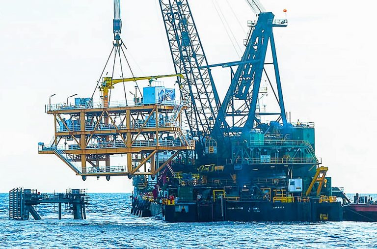 Oil extends gains, Brent nears $59