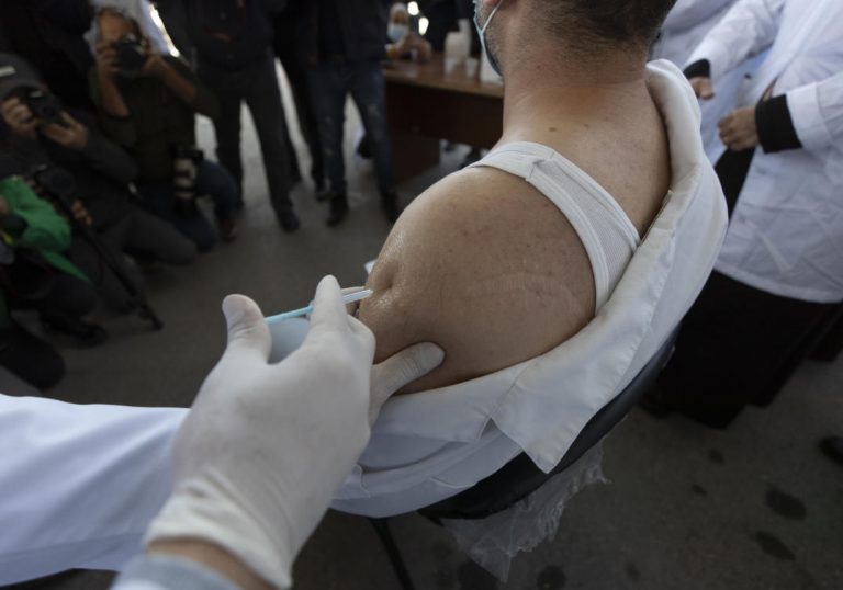IMF says vaccines to fuel Mideast recovery, tough path ahead