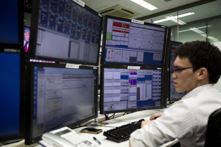 Asian stocks edge higher, led by rally in commodities