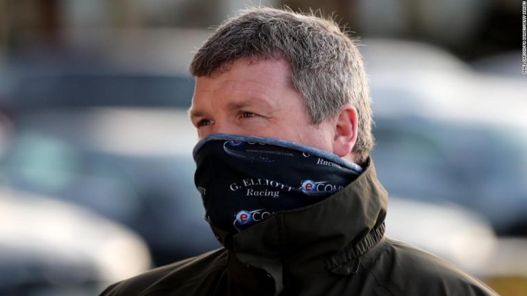 Top racing trainer Gordon Elliott apologizes over photo of himself sitting on a dead horse