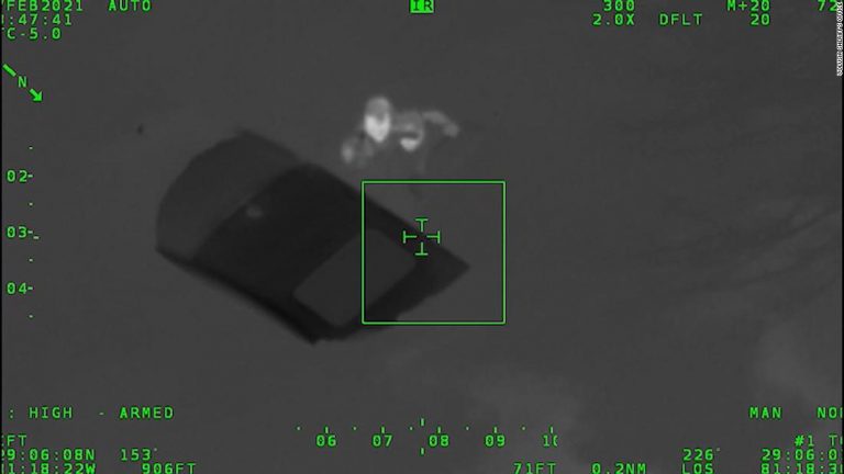 Video shows deputies rescuing woman from sinking car