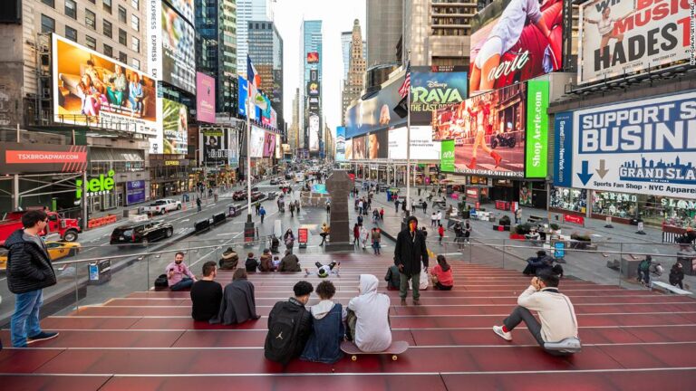 A year after the pandemic was declared, US Covid-19 numbers are way too high to relax just yet, CDC director warns