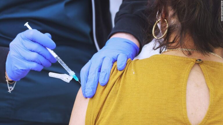 Experts say it’s a race between coronavirus variants and vaccines in the US as air travel hits records