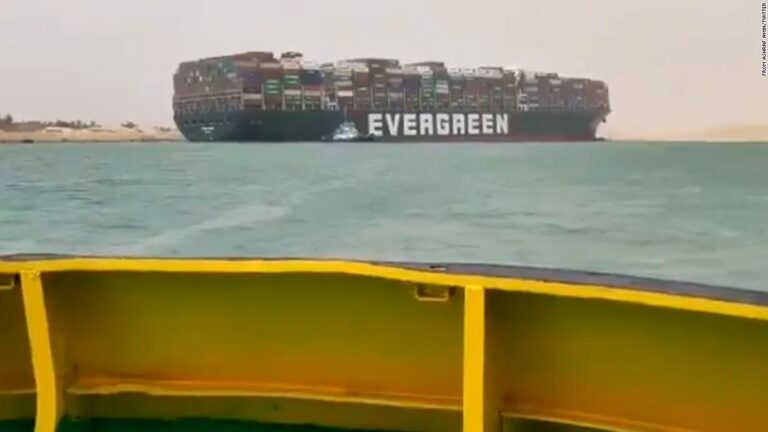 Container ship runs aground in Suez Canal causing traffic jam