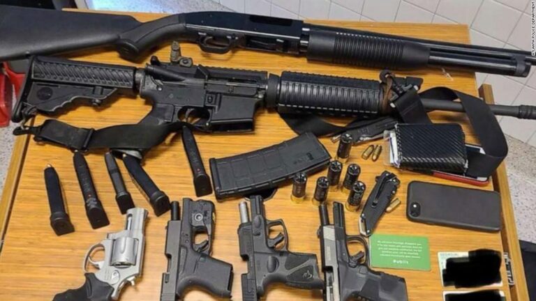 He heard what he believed was someone loading guns in a bathroom stall. Police arrested a man with 6 guns