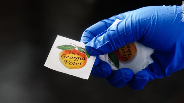 Corporate giants bow to pressure in Georgia voting law backlash