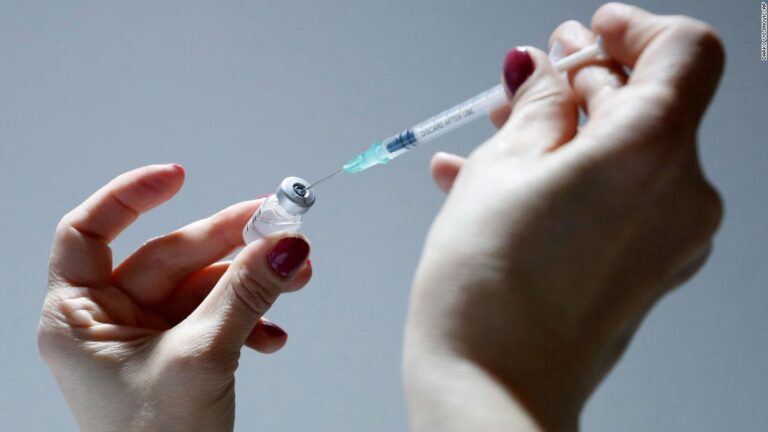 The temporary halt comes as UK regulators review the occurrence of rare blood clots in adults