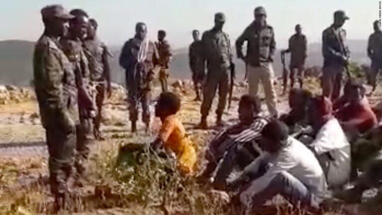 Video shows soldiers egging each other on and tossing bodies over a cliff in Tigray
