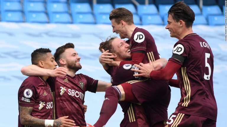 Manchester City stunned by 10-man Leeds United