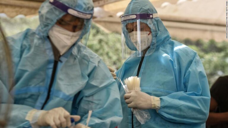 India hits 100 million vaccinations as Covid-19 cases surge to record numbers