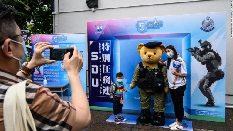 Hong Kong marks National Security Education Day with goose-stepping police and souvenirs