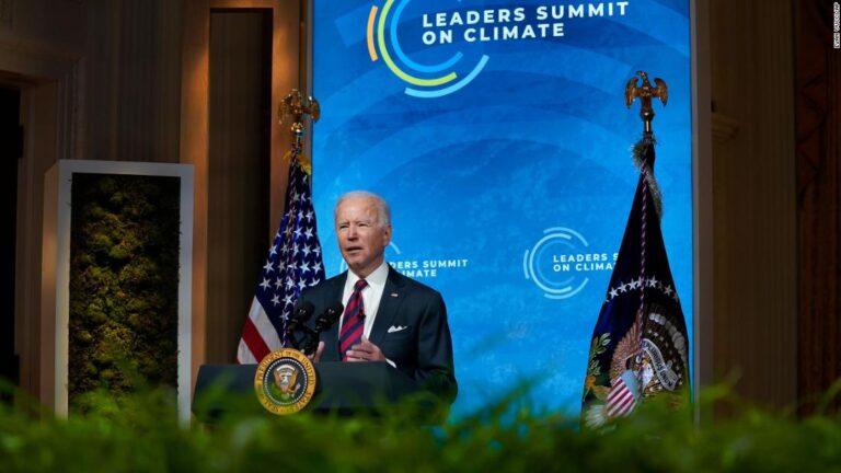 US will aim to cut carbon emissions by as much as 52% by 2030, Biden announces