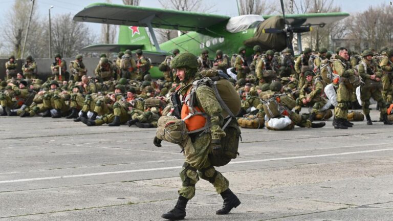 Russia orders troops back to base after massive buildup near Ukraine border