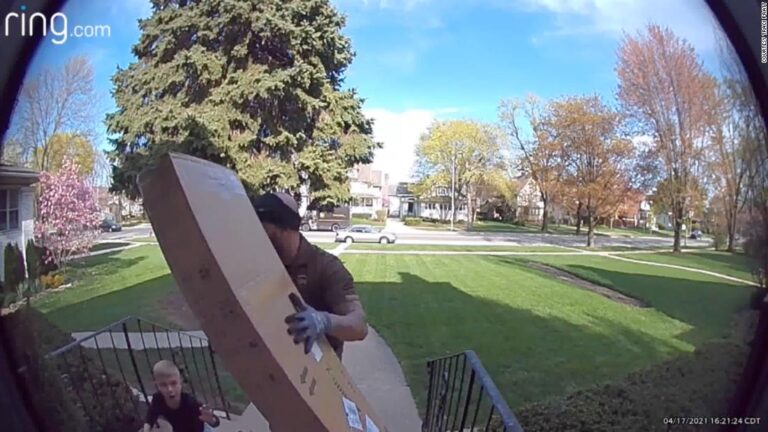 UPS driver rescues young boy pinned under heavy package