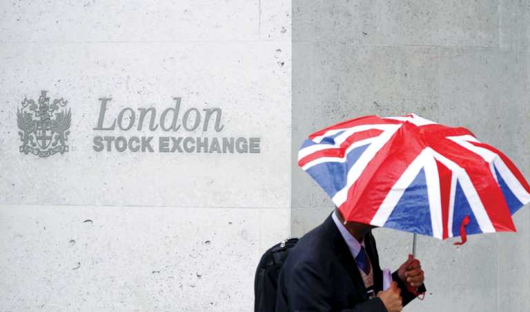Stocks slip off record highs ahead of earnings, US data
