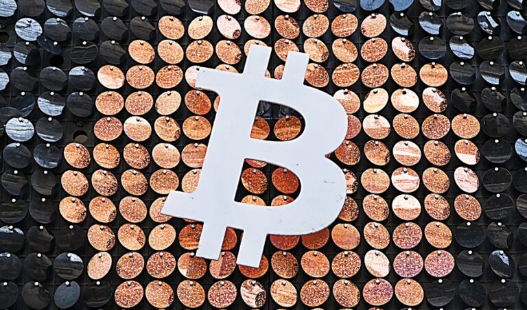 Bitcoin sinks below $50,000 as cryptos stumble