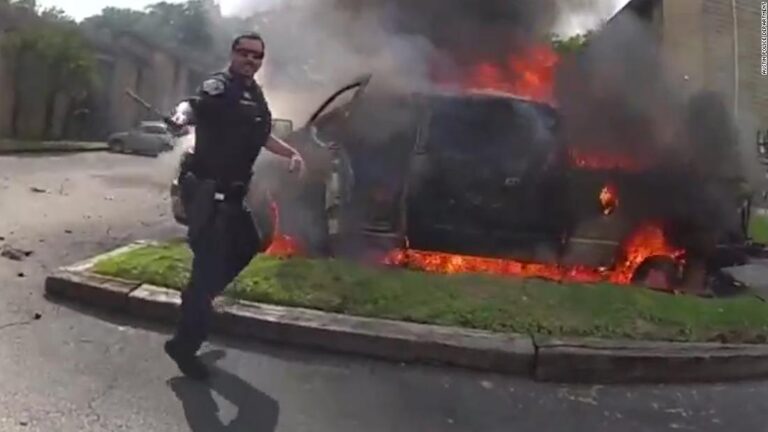 See the moment Austin cops save man from burning truck