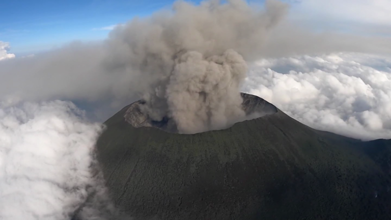 Remarkable aerial video shows volcano spewing ash