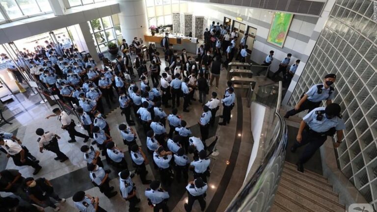 Hong Kong police declare Apple Daily newsroom a crime scene as editors and executives arrested under national security law