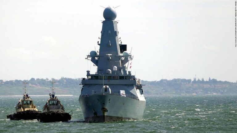 Russia says it fired warning shots on British warship but UK denies the claim