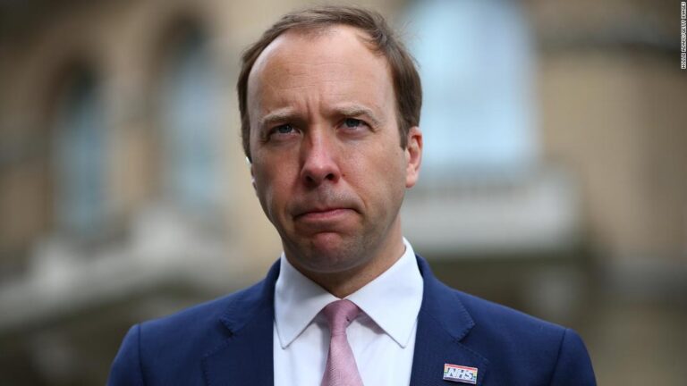 Matt Hancock apologizes after being caught in embrace with aide