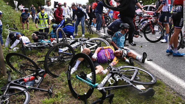 Tour de France spectator causes massive crash