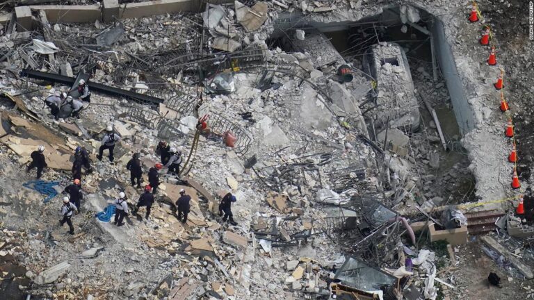 Officials begin inspections of nearby buildings after Florida condo collapse leaves 9 dead and more than 100 missing