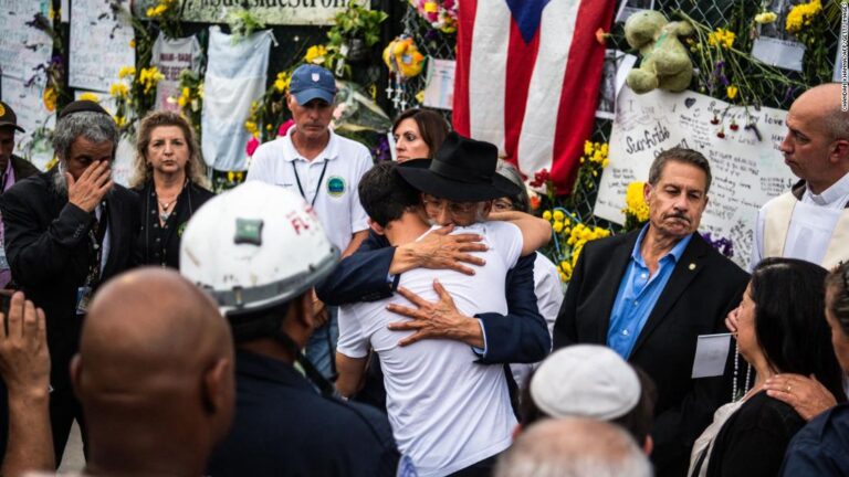 The Surfside community gathers for a memorial as search efforts turn from rescue to recovery