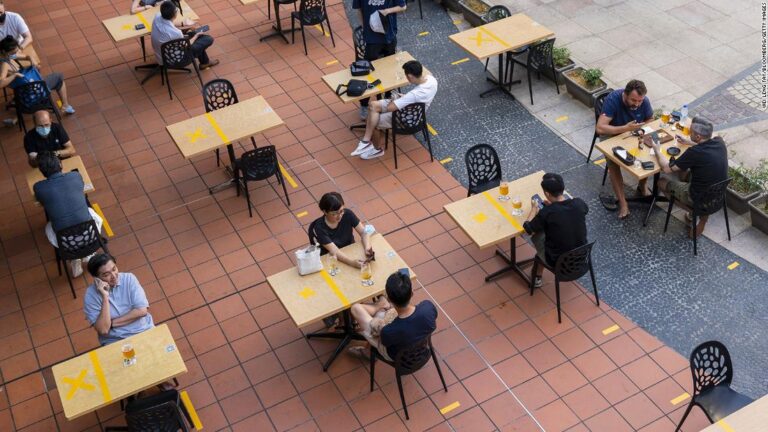 Singapore and the UK are both planning to ‘live with Covid.’ They’re worlds apart on how to do that