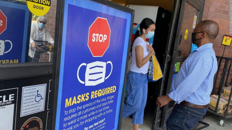 CDC tells vaccinated Americans in Covid hot spots to mask up again