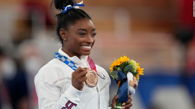 Biles speaks at press conference after medal