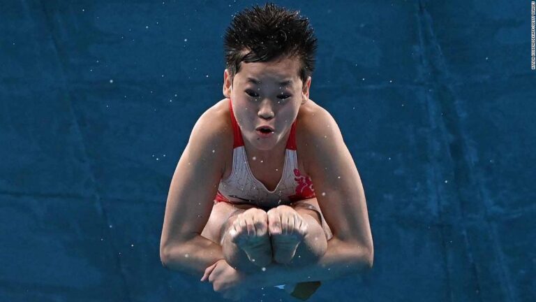 14-year-old sensation wins gold with perfect-10 dives