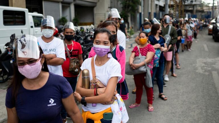 Manila residents crowd vaccination centers in rush before lockdown